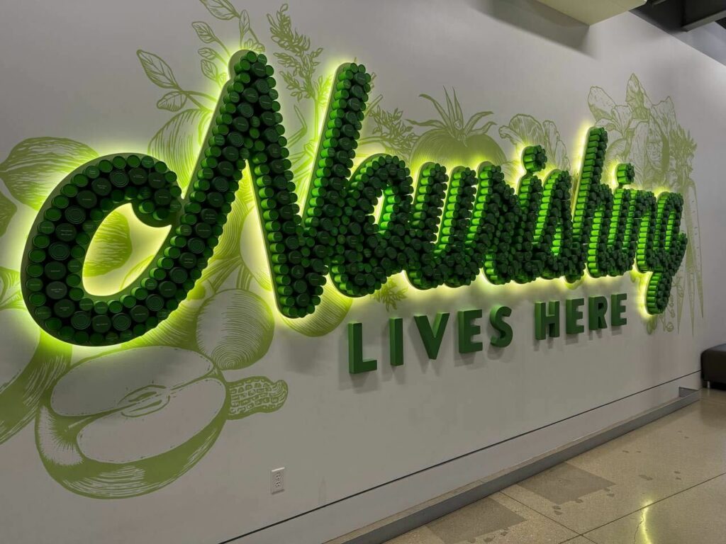 Nourishing Lives Here sign